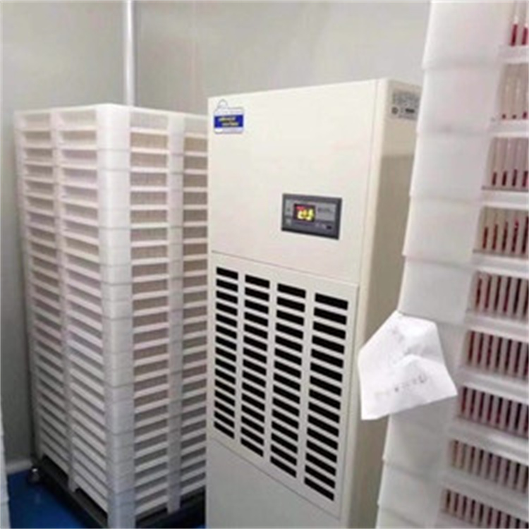 梧州高温季节易受潮如何改善?购买杭州井泉环保科技有限公司生产的杭井牌:CFZ-20/S 380V/50Hz 除湿量20kg/h抽湿机来解决